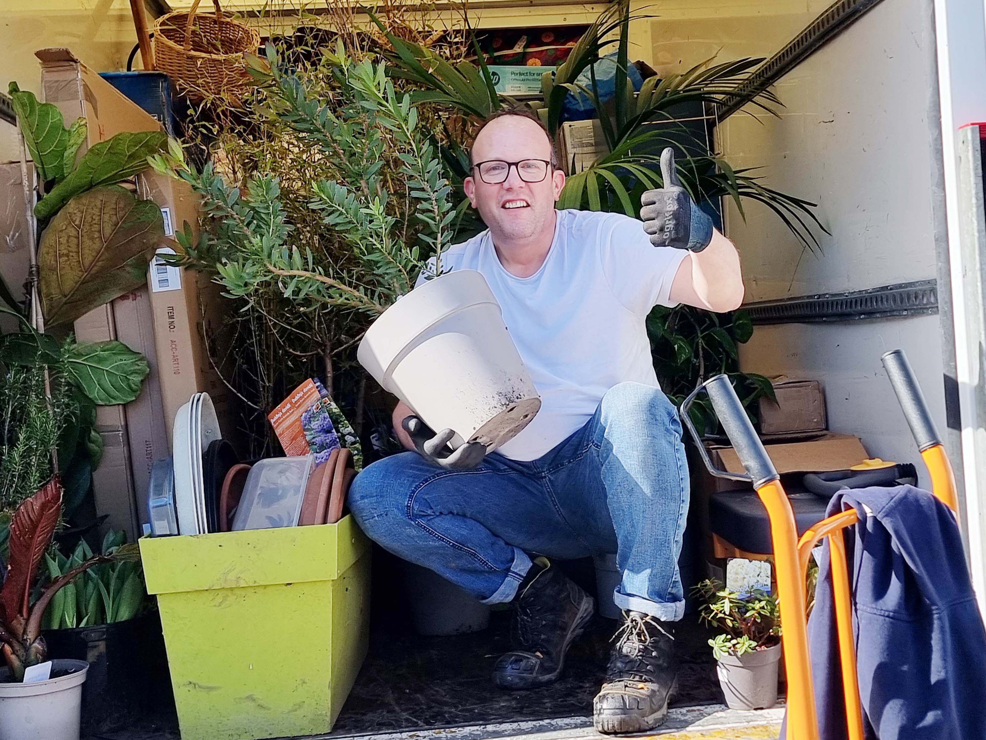 Eddy loading a domestic waste clearance into the van